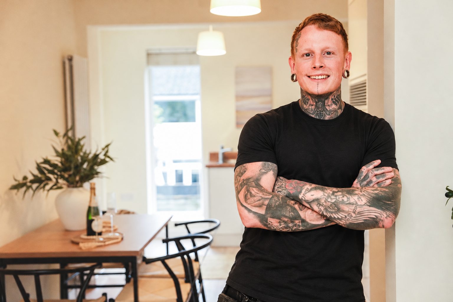 Ryan Pickles, founder of PropertyPickles, standing in a renovated kitchen-diner
